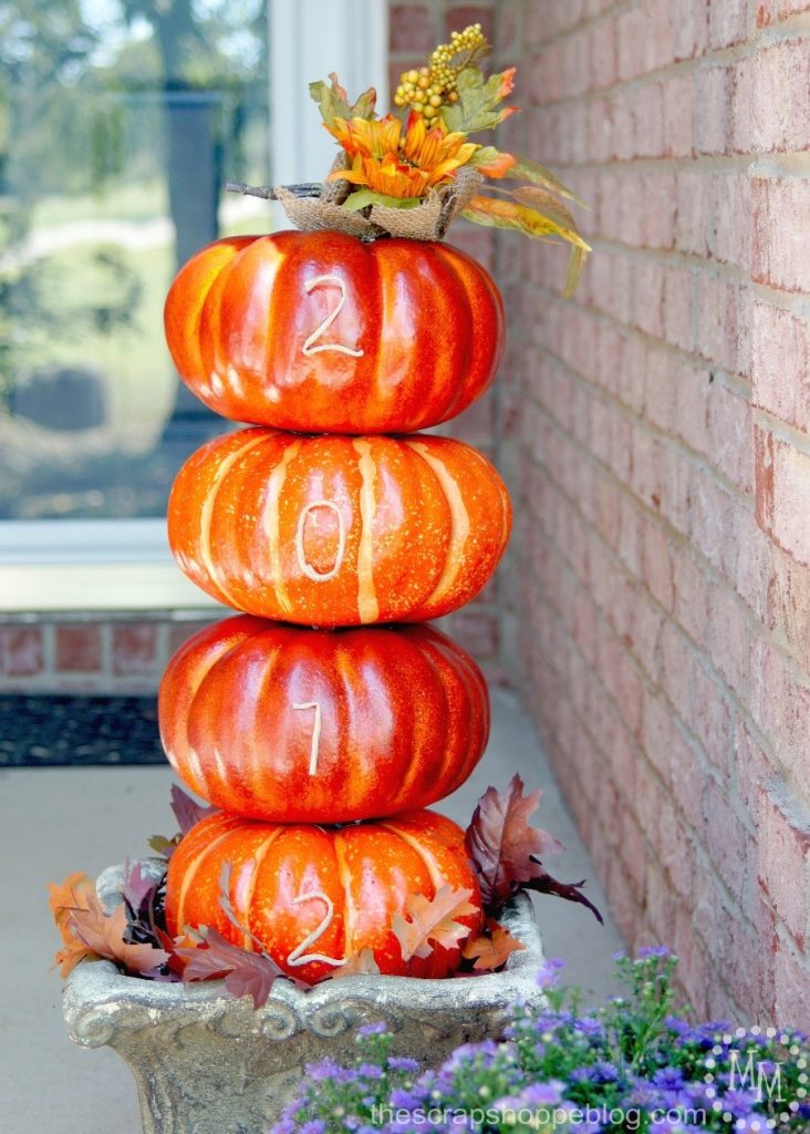 Display your house number on a DIY pumpkin topiary for a festive front porch idea!