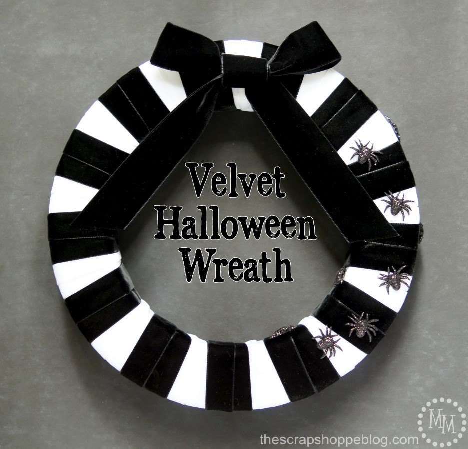 A black and white wreath is classic for Halloween. Make it striped and made with velvet ribbon and it's downright skeletal looking and has vintage look and feel!