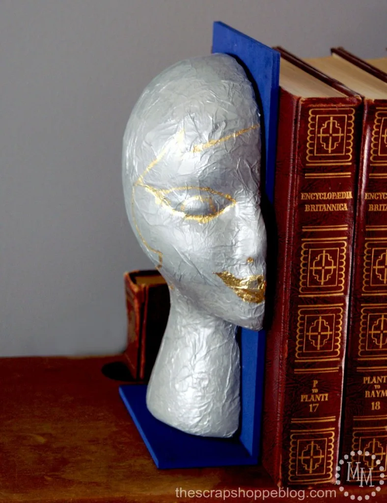 guilded-woman's-face-bookend