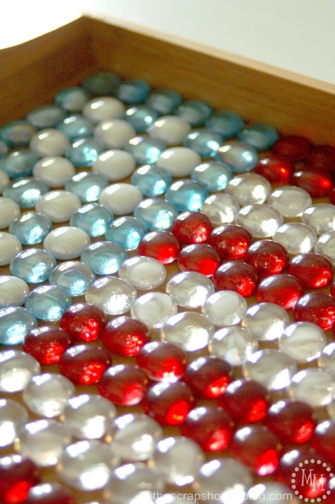 Red, white, and blue serving tray made with glass beads and epoxy.