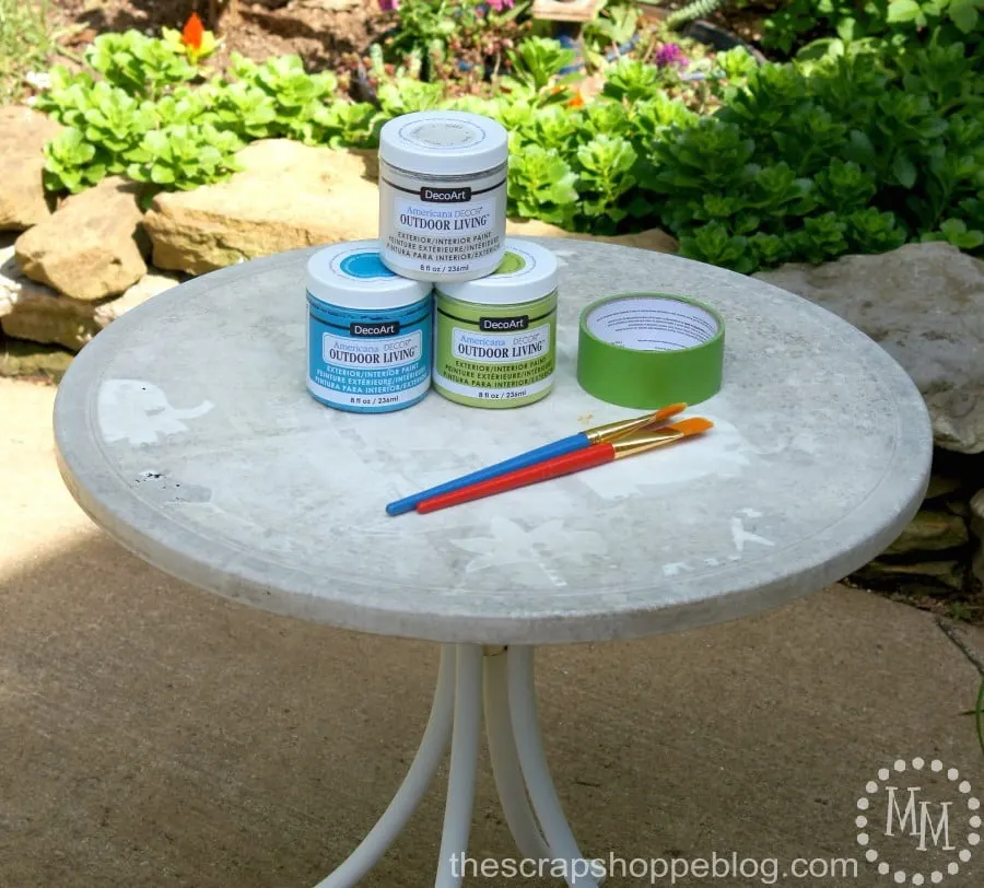 Give an old outdoor table a fresh new look with paint and a stencil!