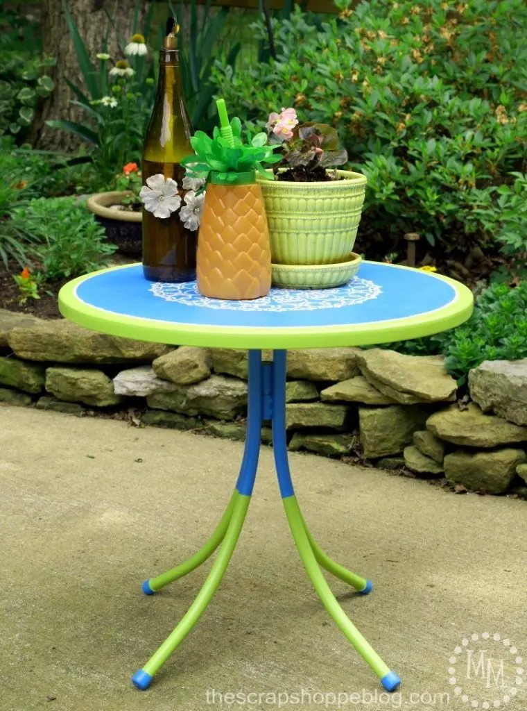Give an old outdoor table a fresh new look with paint and a stencil!