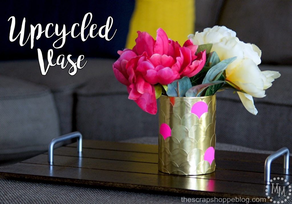 Create an upcycled vase with a cardboard tube. Dress it up with pretty foiled labels!