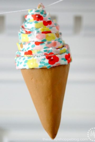 Foam Ice Cream Cone Garland using cones and fabric. So fun for an ice cream party! #MakeItFunCrafts