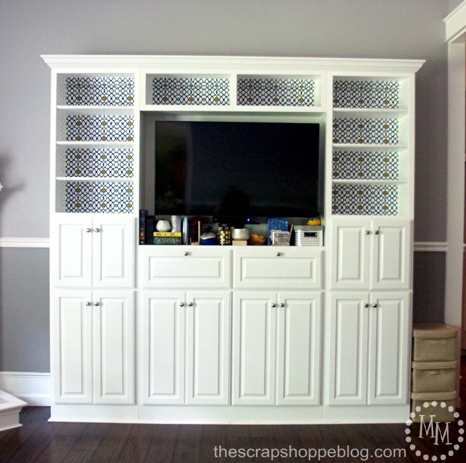 This plain Jane media center got a fun makeover with adhesive vinyl!