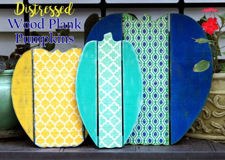 Distressed Wood Plank Pumpkins make the perfect outdoor pumpkin patch that will last all fall!