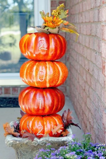 Display your house number on a DIY pumpkin topiary for a festive front porch idea!