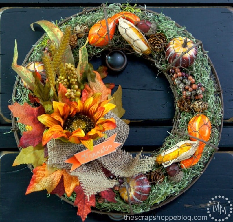 This chicken wire wreath can be filled with just about anything and is the perfect harvest wreath when filled with Spanish moss and gourds!