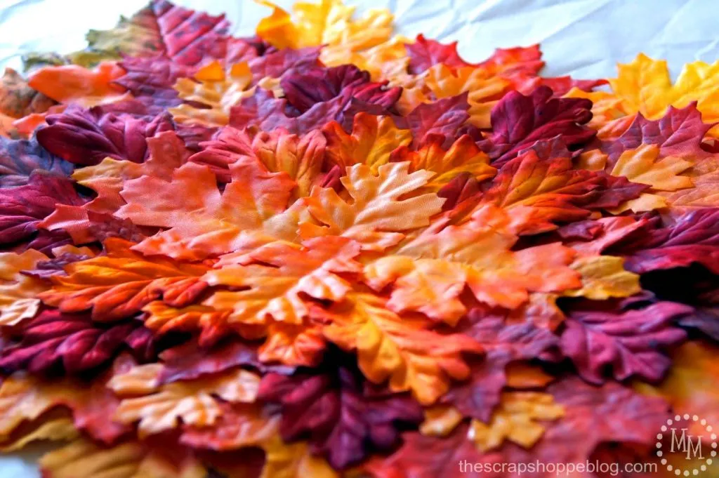 DIY your own leaf mat decor by layering faux leaves!