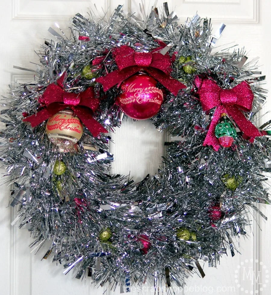 Giant tinsel garland make a fantastic vintage-looking wreath! Add vintage ornaments to complete the look.