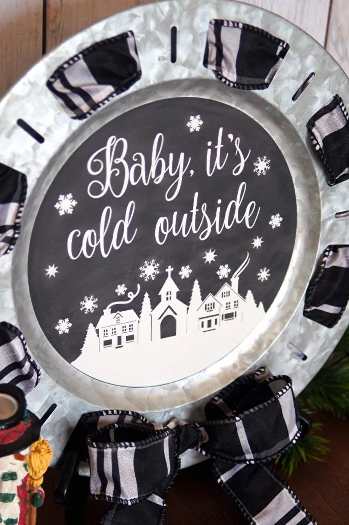 Beat the post Christmas blues with some fun winter decor like this chalkboard winter scene made with adhesive vinyl!