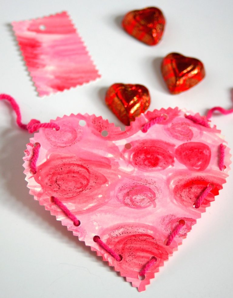 DIY your own watercolor Valentines stuffed full of chocolates with just a handful of supplies!