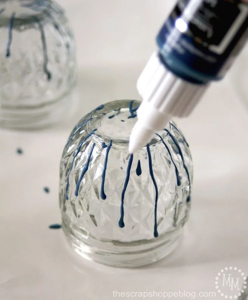 Get your desk organized in a bold way with some fun dripped paint storage jars!