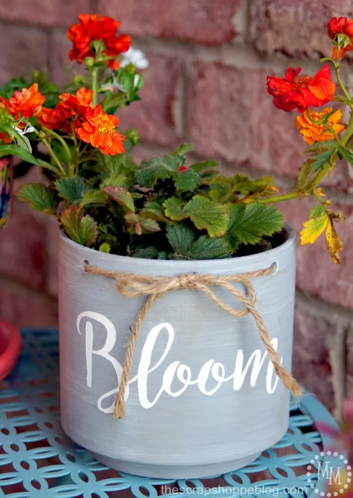 Update your front porch not just with fresh flowers, but with some fresh paint as well!