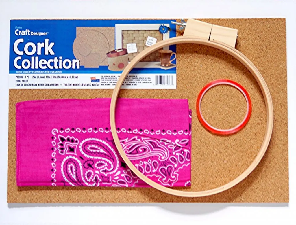Take your organization UP off of your desk and onto your wall with an embroidery hoop organizer!