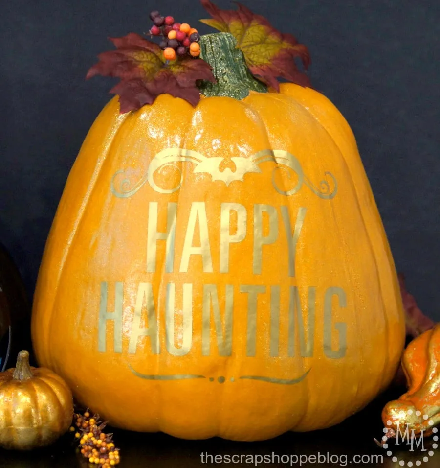 This ghoulishly glam pumpkin is perfectly topped off with gold adhesive vinyl!