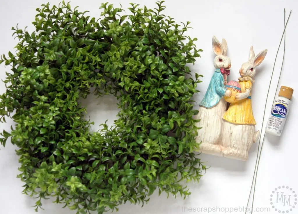 Dress up a boxwood wreath with an Easter figurine to celebrate the holiday!