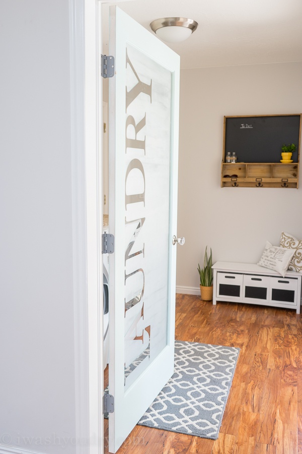 Your laundry room doesn't have to be boring. Start dressing it up from the outside with a fun door!