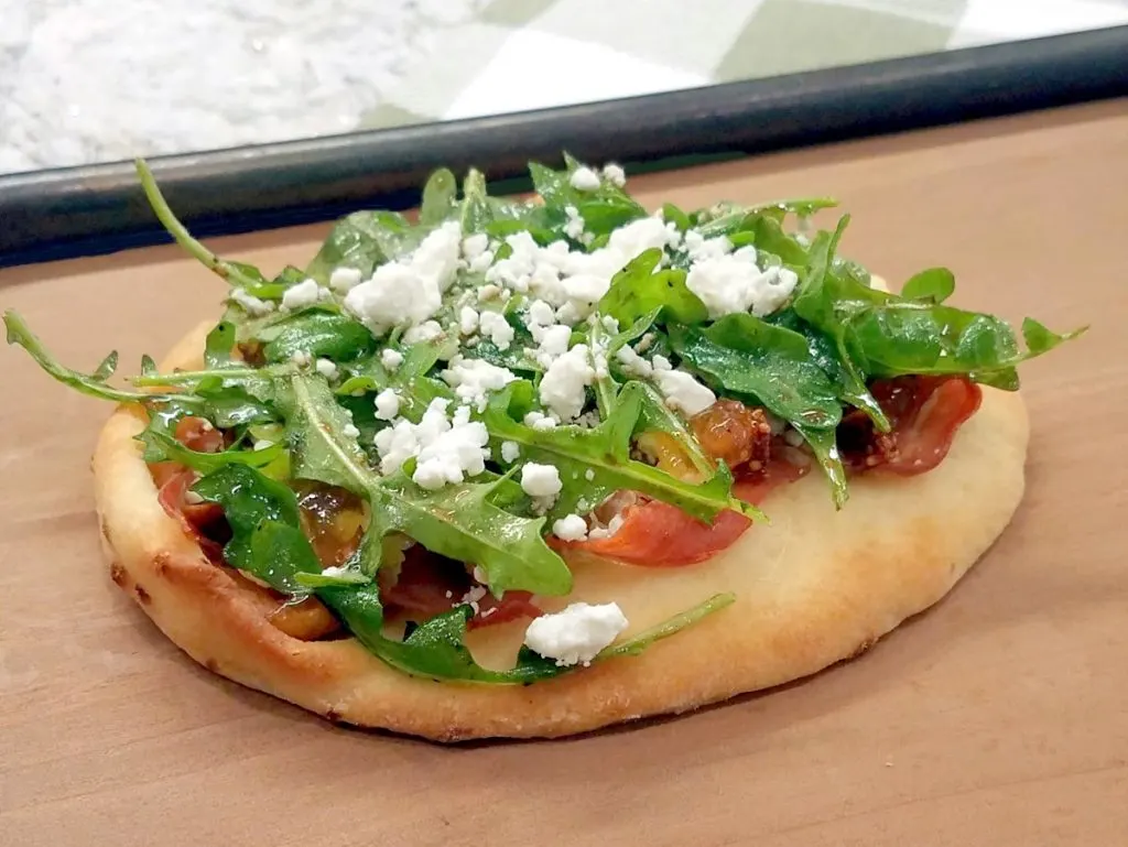 This fig & pig flatbread is a wonderful appetizer or even a meal since you won't be able to stop at just one bite.